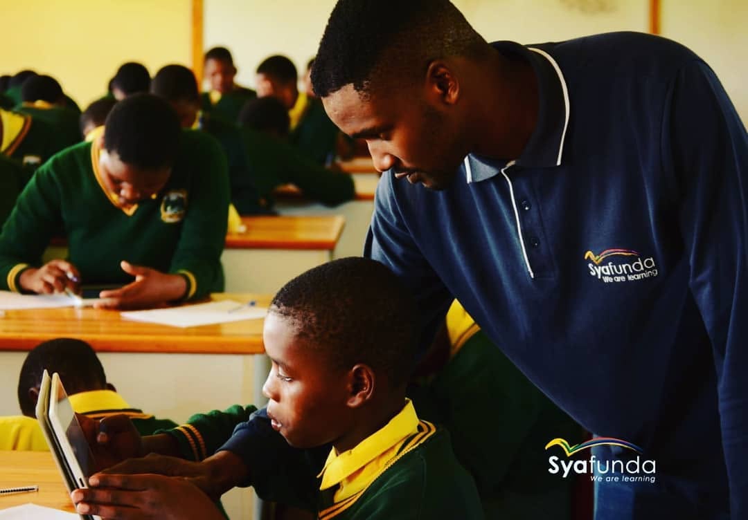 South African learners studying with tablets